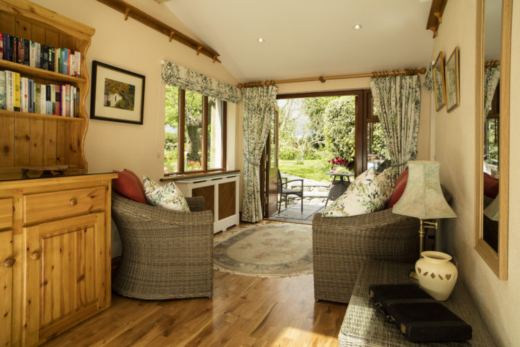 View from inside Honeymoon Cottage to the gardens