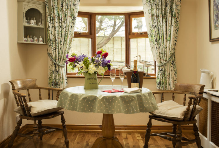 Intimate dining area in Honeymoon Cottage