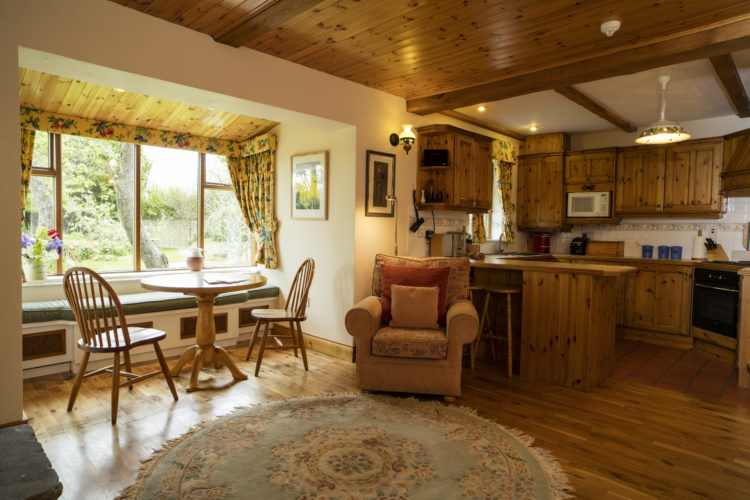 The dining area and kitchen in Garden Cottage