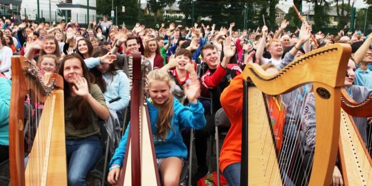 Young people with harps
